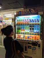 Max in awe of a Japanese vending machine in Tokyo